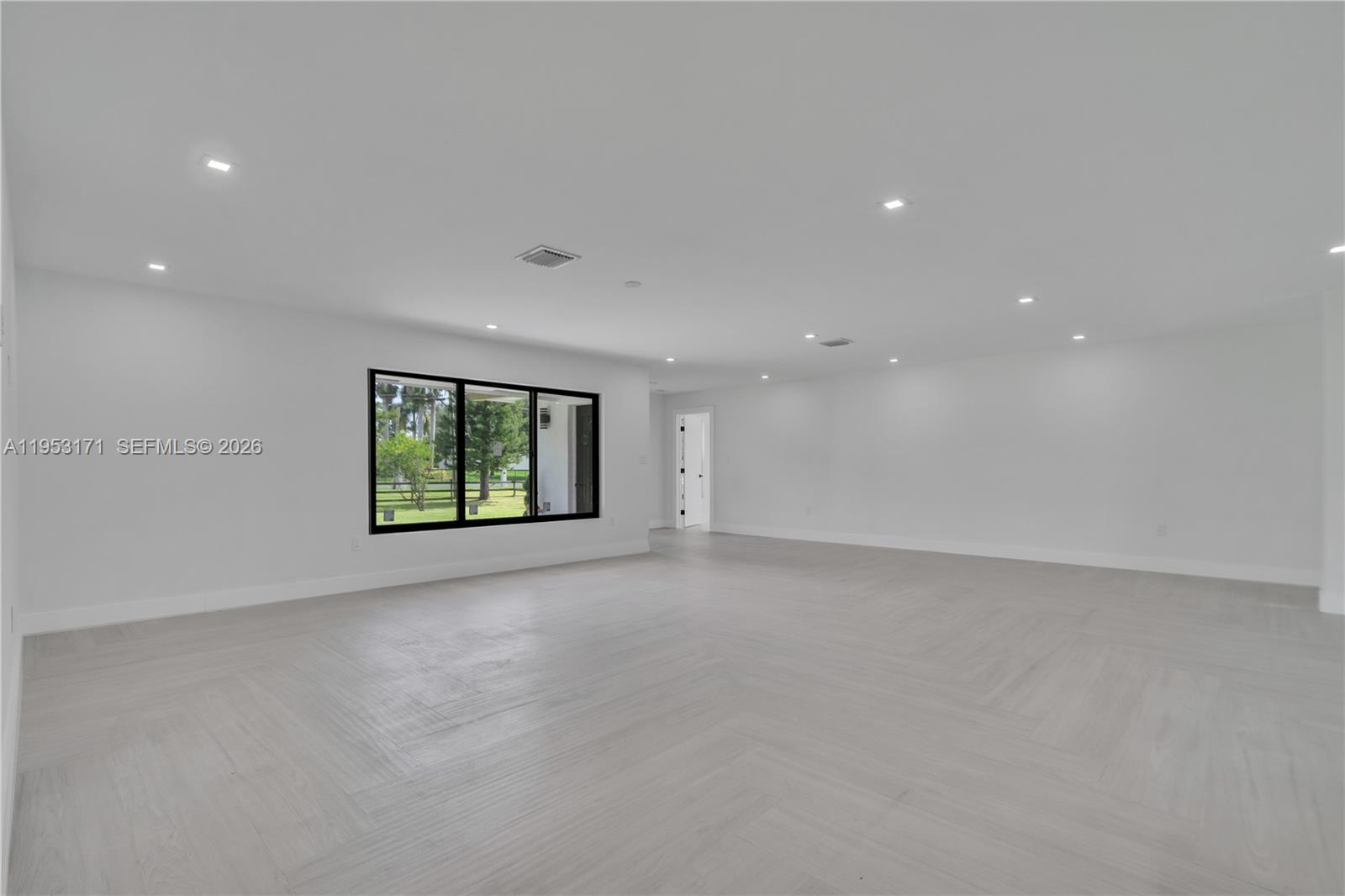 17680 Southwest 54th Street Southwest Ranches, FL 33331 - Photo 15 of 40 a view of an empty room with a window