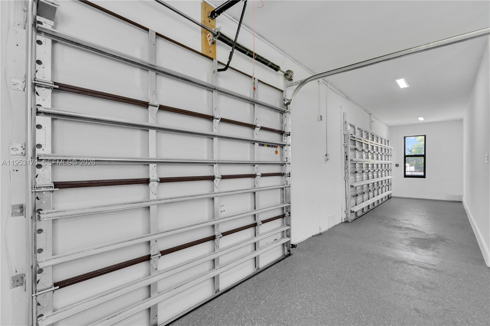 17680 Southwest 54th Street Southwest Ranches, FL 33331 - Photo 31 of 40 a view of a room with racks on the wall