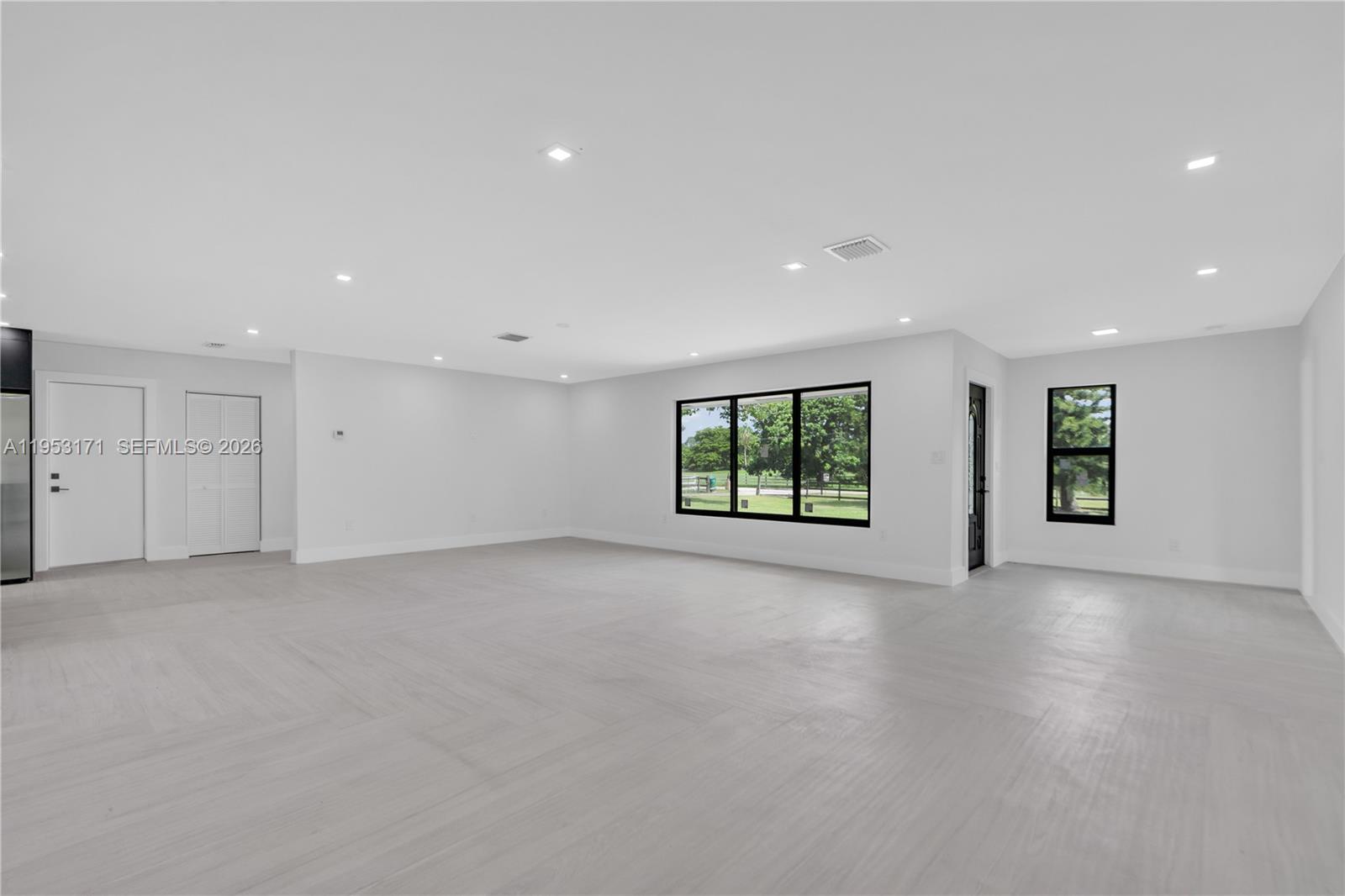 17680 Southwest 54th Street Southwest Ranches, FL 33331 - Photo 5 of 40 an empty room with windows