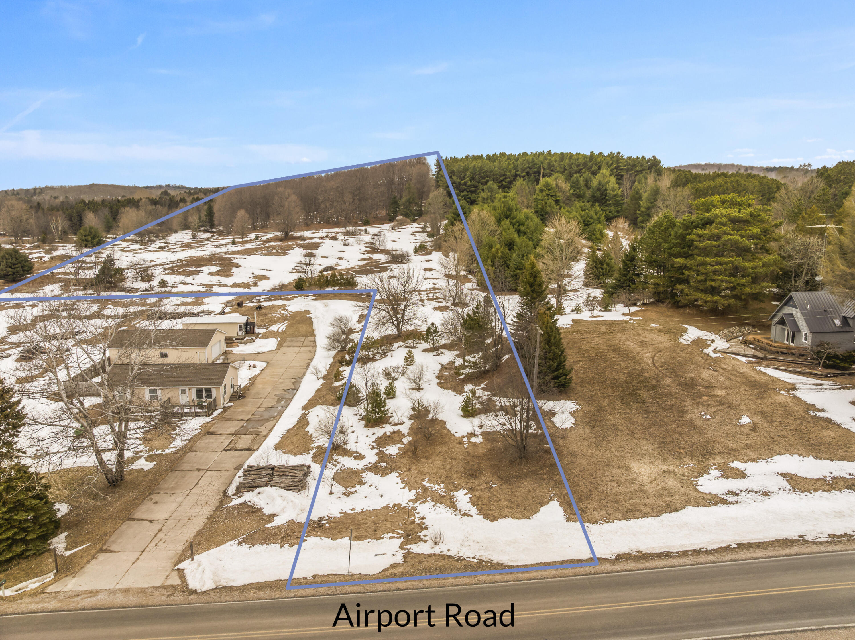 Airport Road Frankfort, MI 49635 - Photo 4 of 11 DJI_20260303141643_0005_D
