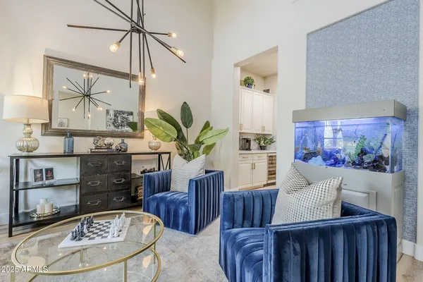 a living room with furniture and a table