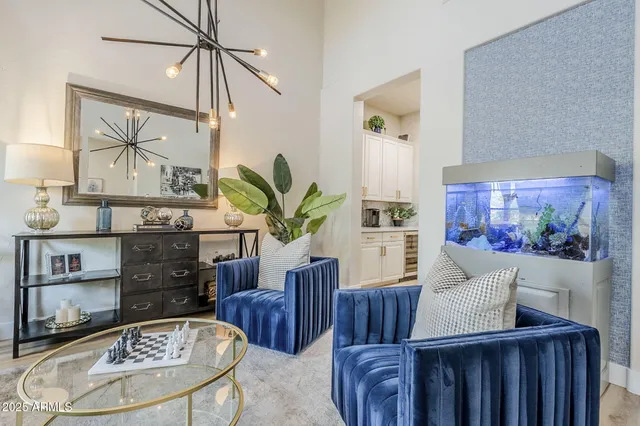 a living room with furniture and a table