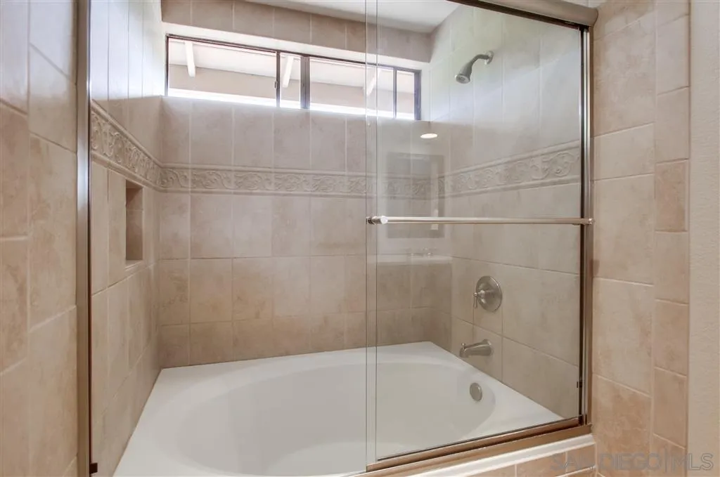 14032 Old Station Road Poway, CA 92064 - Photo 15 of 25 a bathroom with a bathtub