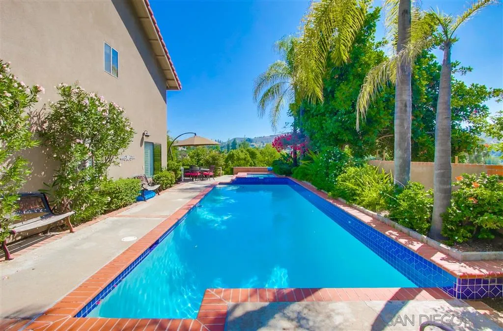 14032 Old Station Road Poway, CA 92064 - Photo 24 of 25 a view of swimming pool with a backyard and seating area