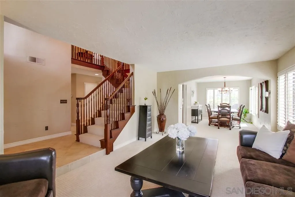 14032 Old Station Road Poway, CA 92064 - Photo 5 of 25 a living room with furniture and wooden floor
