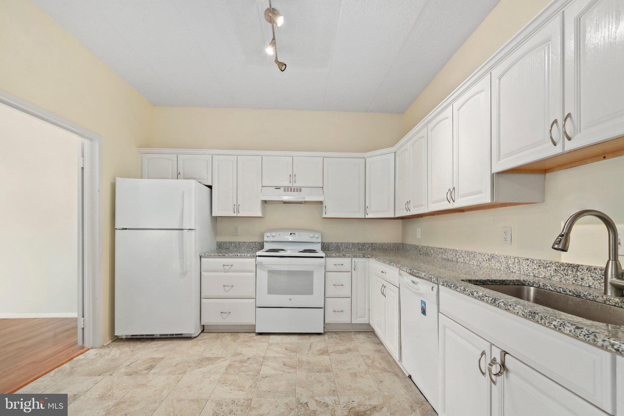 2116 Green Watch Way, Unit 10/201D Reston, VA 20191 - Photo 11 of 32 Bright and airy kitchen space.