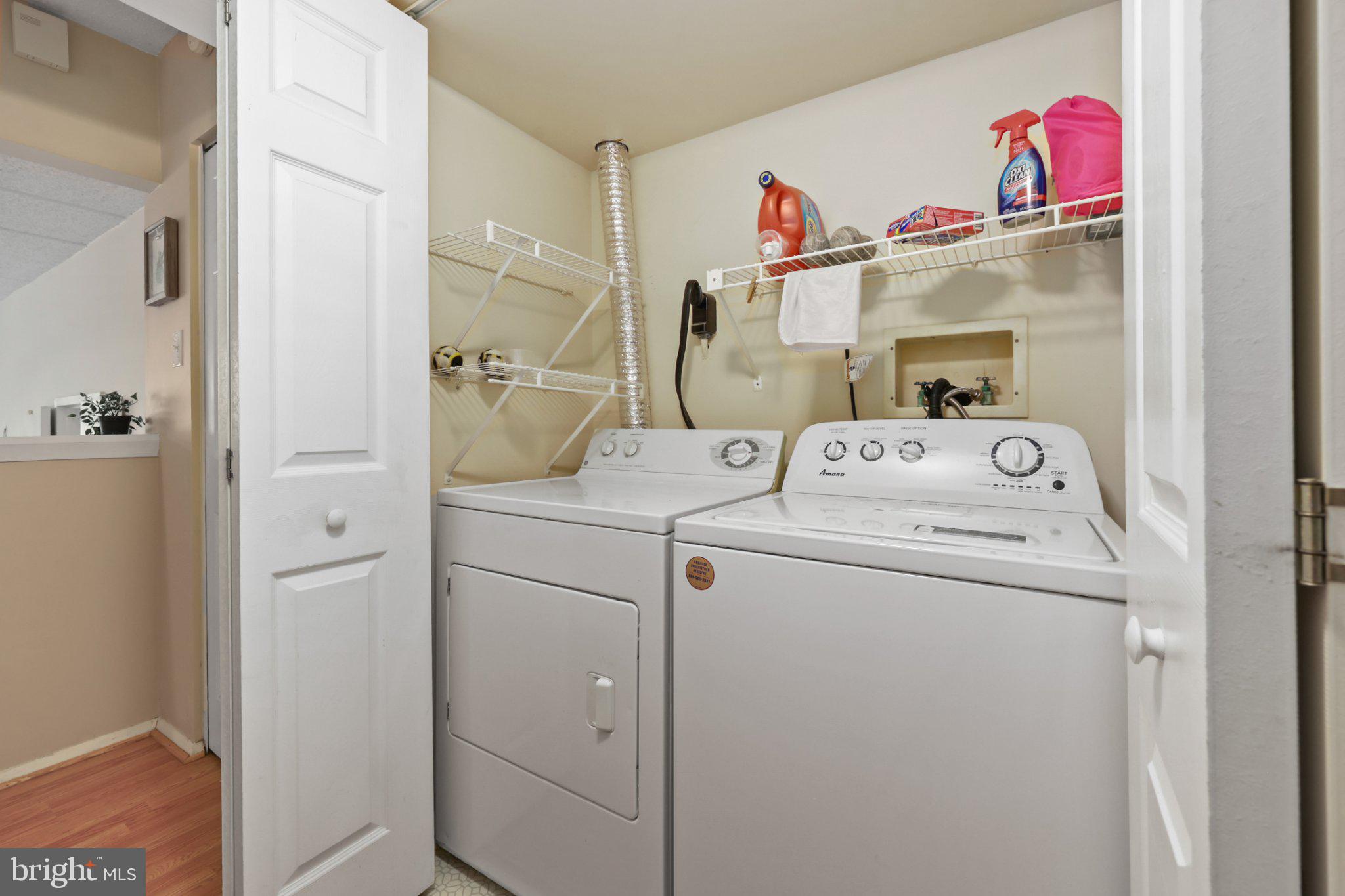 2116 Green Watch Way, Unit 10/201D Reston, VA 20191 - Photo 13 of 32 Efficient laundry space with storage.