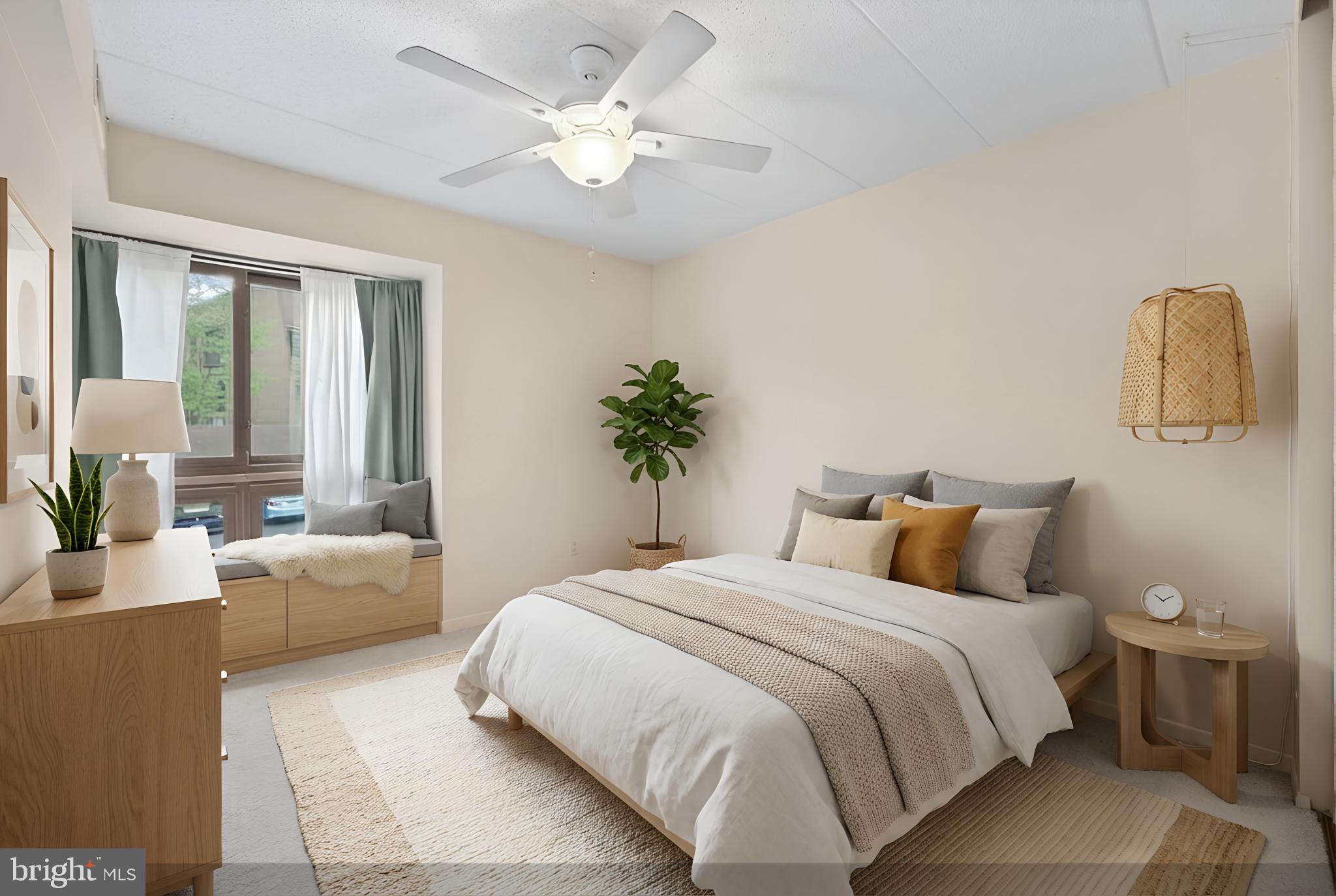 2116 Green Watch Way, Unit 10/201D Reston, VA 20191 - Photo 16 of 32 Serene bedroom with natural light.