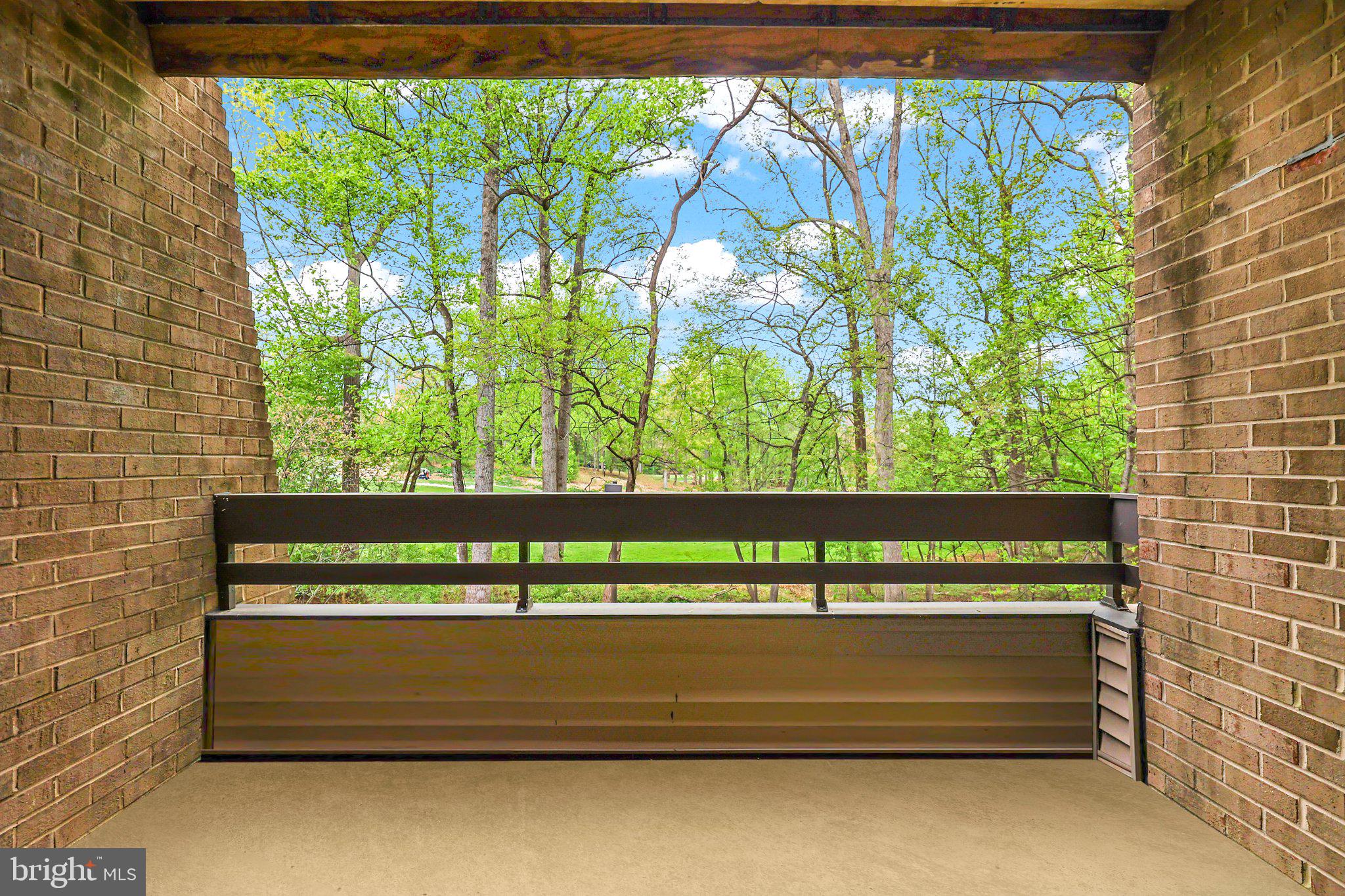 2116 Green Watch Way, Unit 10/201D Reston, VA 20191 - Photo 2 of 32 Serene balcony with lush green views.