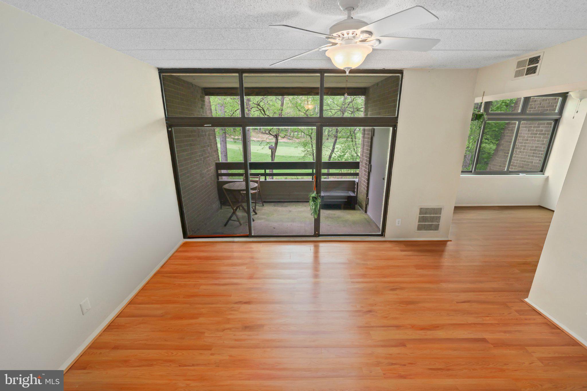 2116 Green Watch Way, Unit 10/201D Reston, VA 20191 - Photo 21 of 32 Bright, airy space with scenic views.