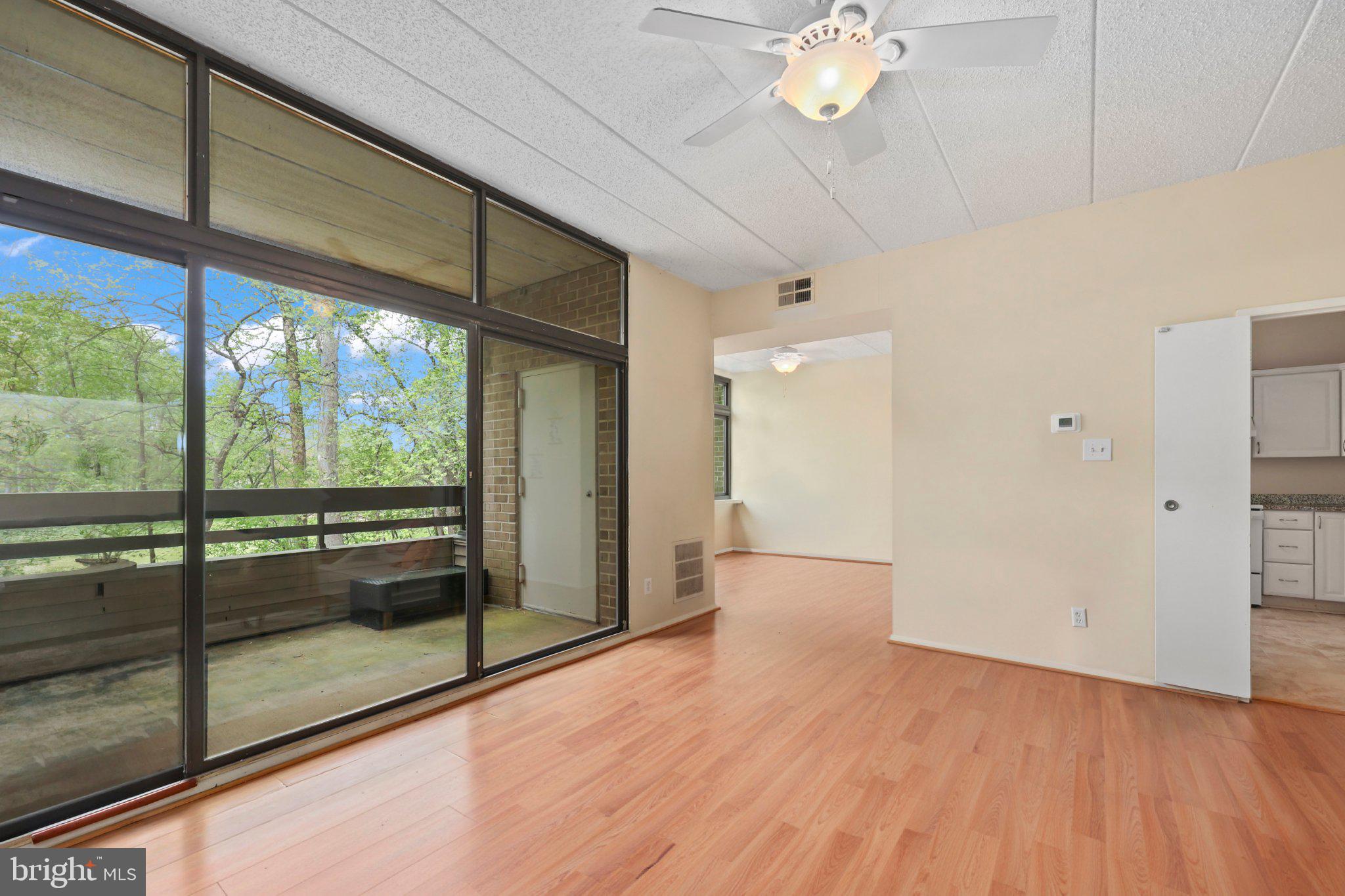 2116 Green Watch Way, Unit 10/201D Reston, VA 20191 - Photo 23 of 32 Bright and airy living space with views.