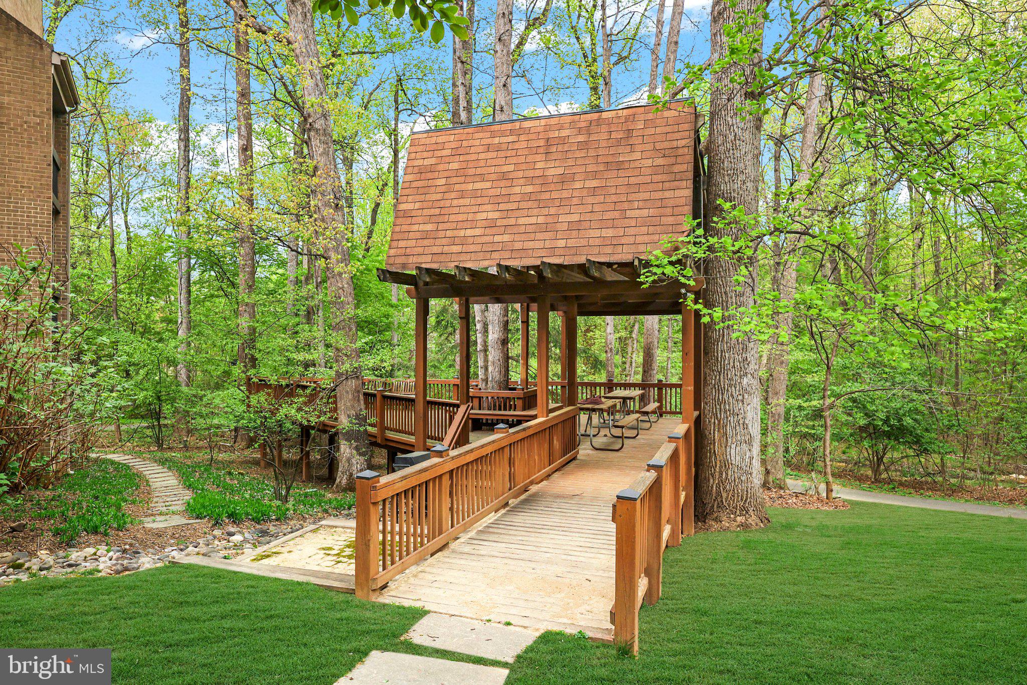 2116 Green Watch Way, Unit 10/201D Reston, VA 20191 - Photo 28 of 32 Charming gazebo nestled in lush greenery.