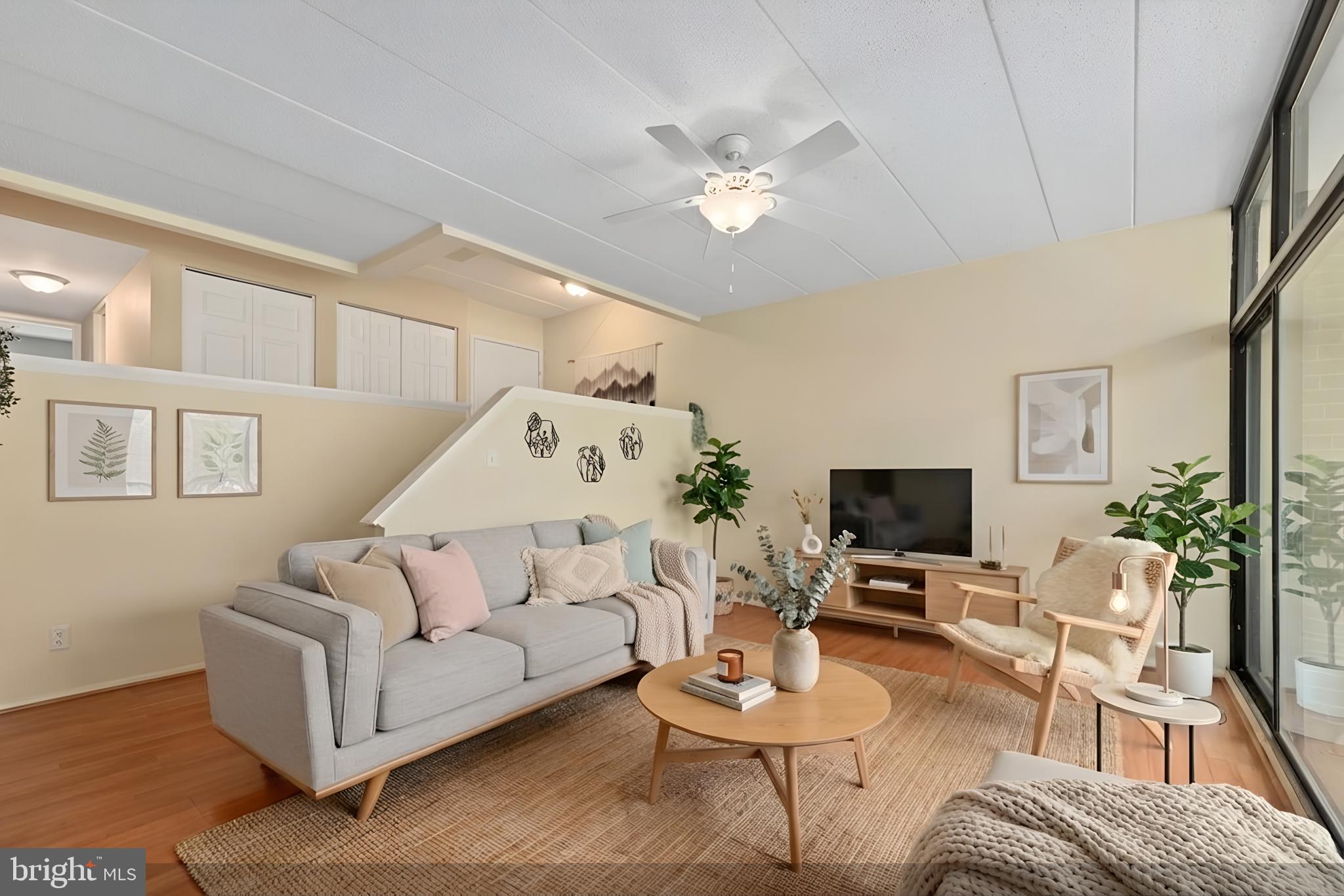 2116 Green Watch Way, Unit 10/201D Reston, VA 20191 - Photo 6 of 32 Bright and airy living space awaits.