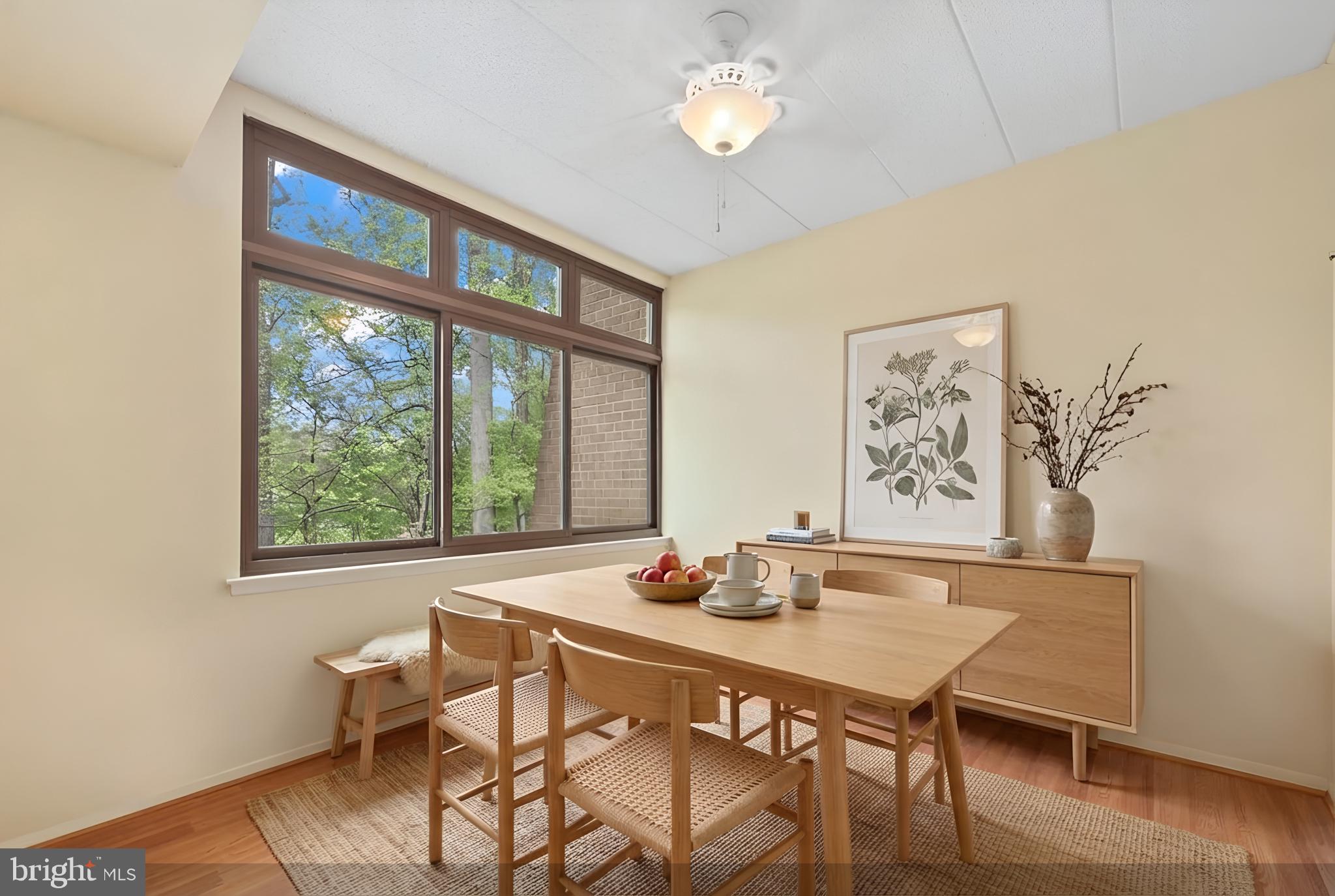 2116 Green Watch Way, Unit 10/201D Reston, VA 20191 - Photo 9 of 32 Bright dining space with nature views.