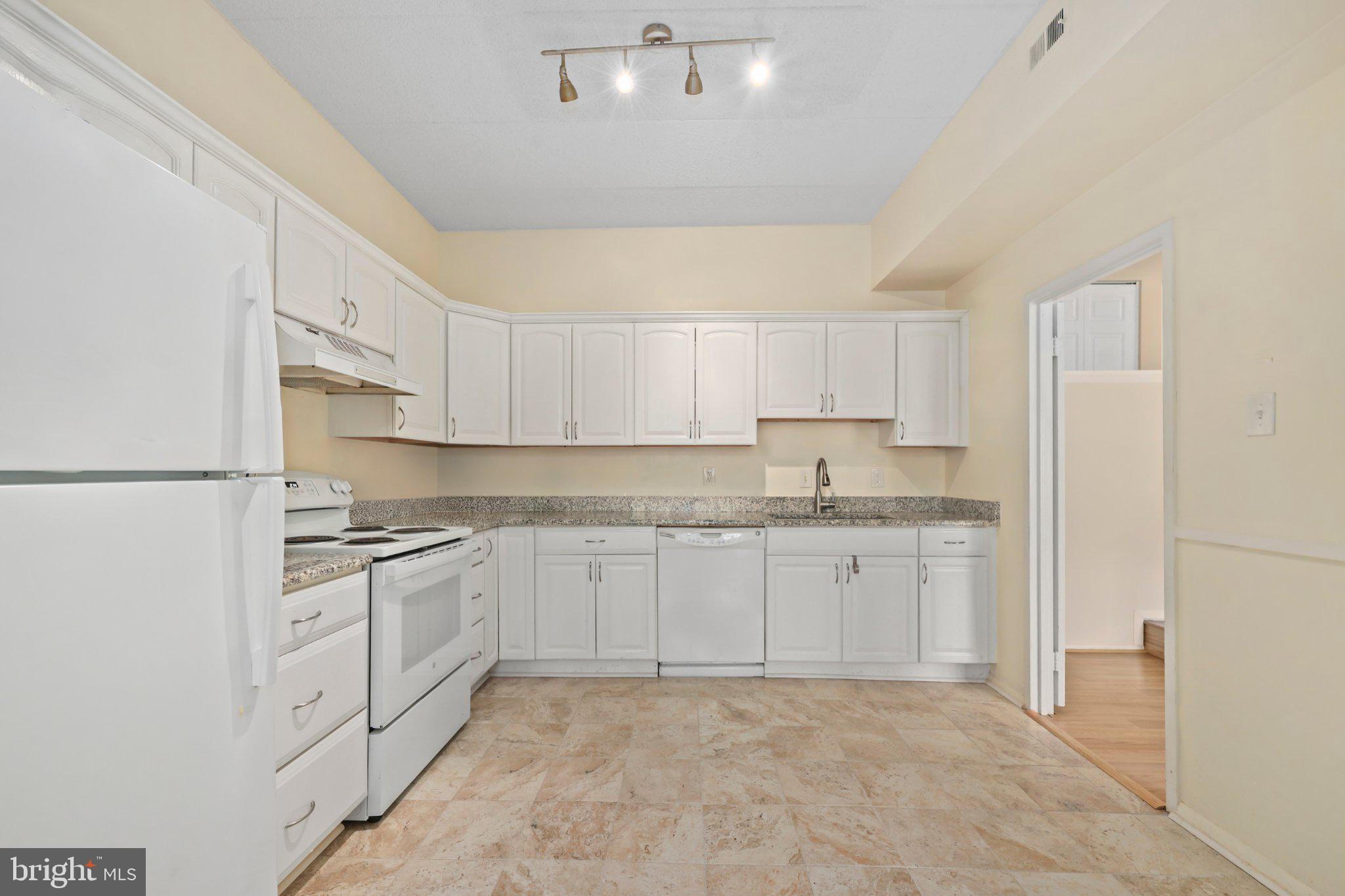 2116 Green Watch Way, Unit 10/201D Reston, VA 20191 - Photo 10 of 32 Bright and airy kitchen space.