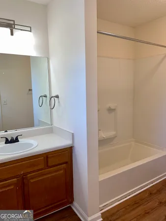 a bathroom with a sink and a bathtub