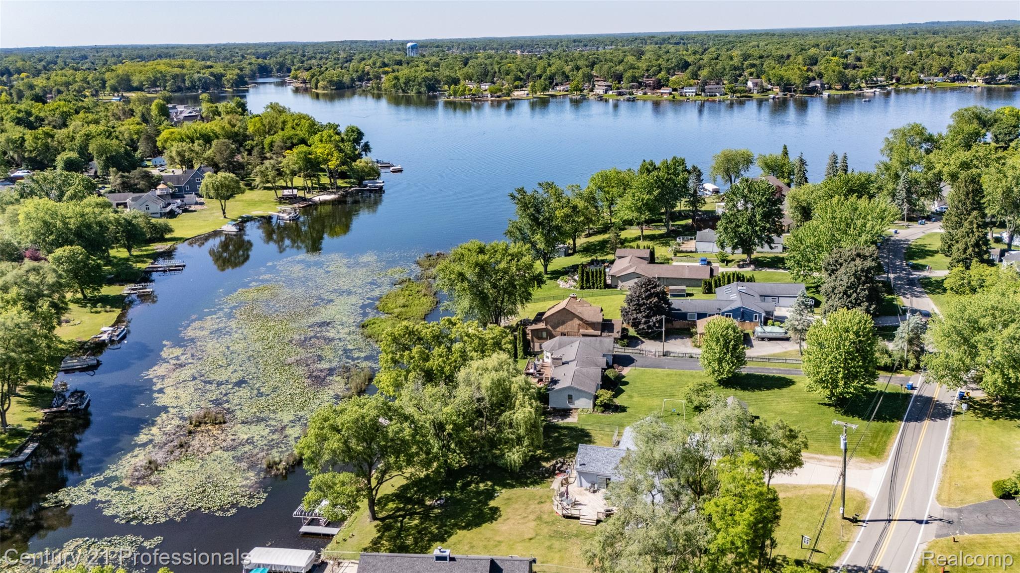 3251 Mann Road Clarkston, MI 48346 - Photo 38 of 40 Expansive lakefront property featuring extensive waterfront, mature trees, and direct water access