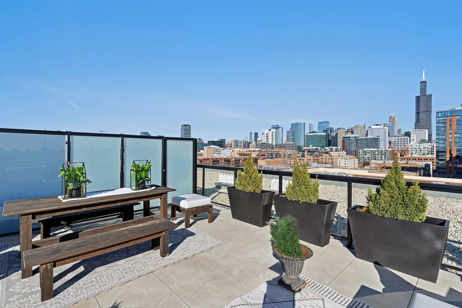 323 South Racine Avenue, Unit PHD Chicago, IL 60607 - Photo 35 of 47 a terrace with outdoor seating and city view
