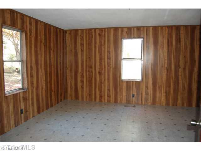 605 Swicegood Waitman Road Lexington, NC 27295 - Photo 7 of 16 Bonus. Bonus room on main floor off of Den could be a third bedroom with addition of a closet.