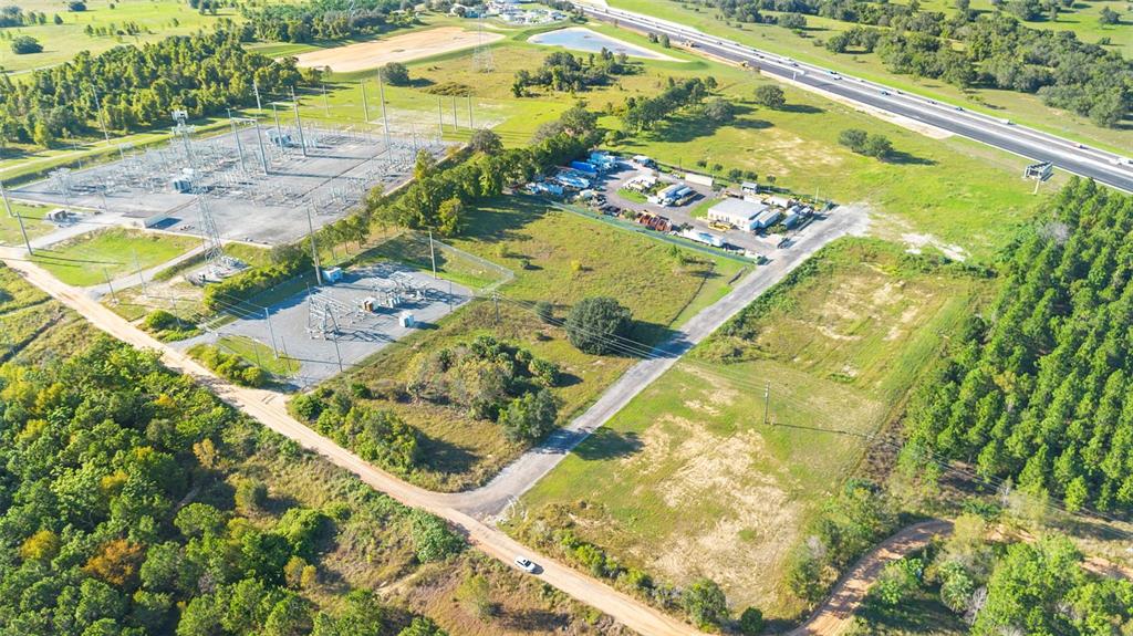 13415 Sullivan Road Minneola, FL 34715 - Photo 11 of 13 a view of a swimming pool from a lake view