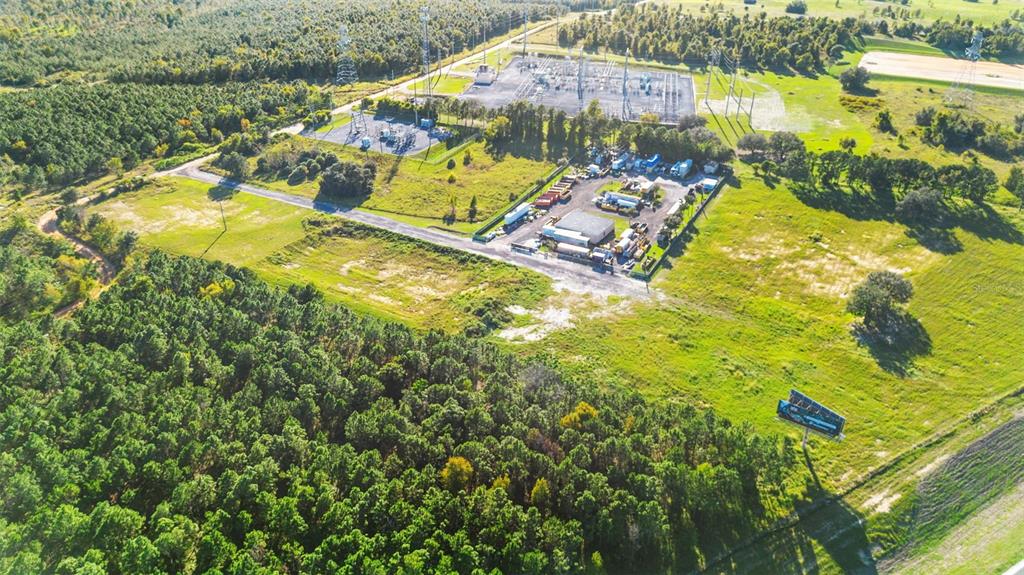 13415 Sullivan Road Minneola, FL 34715 - Photo 10 of 13 a view of a yard with an outdoor space