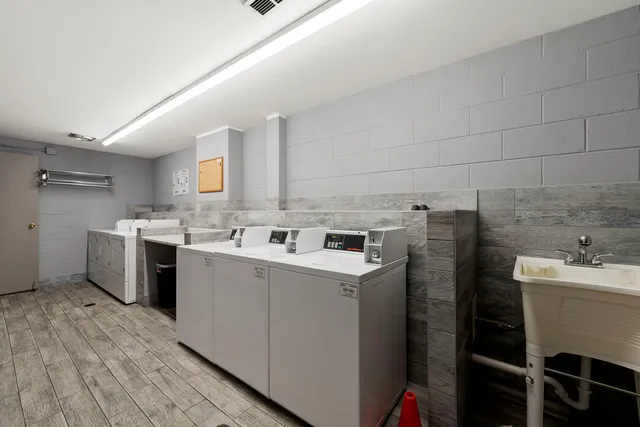 a utility room with washer and dryer