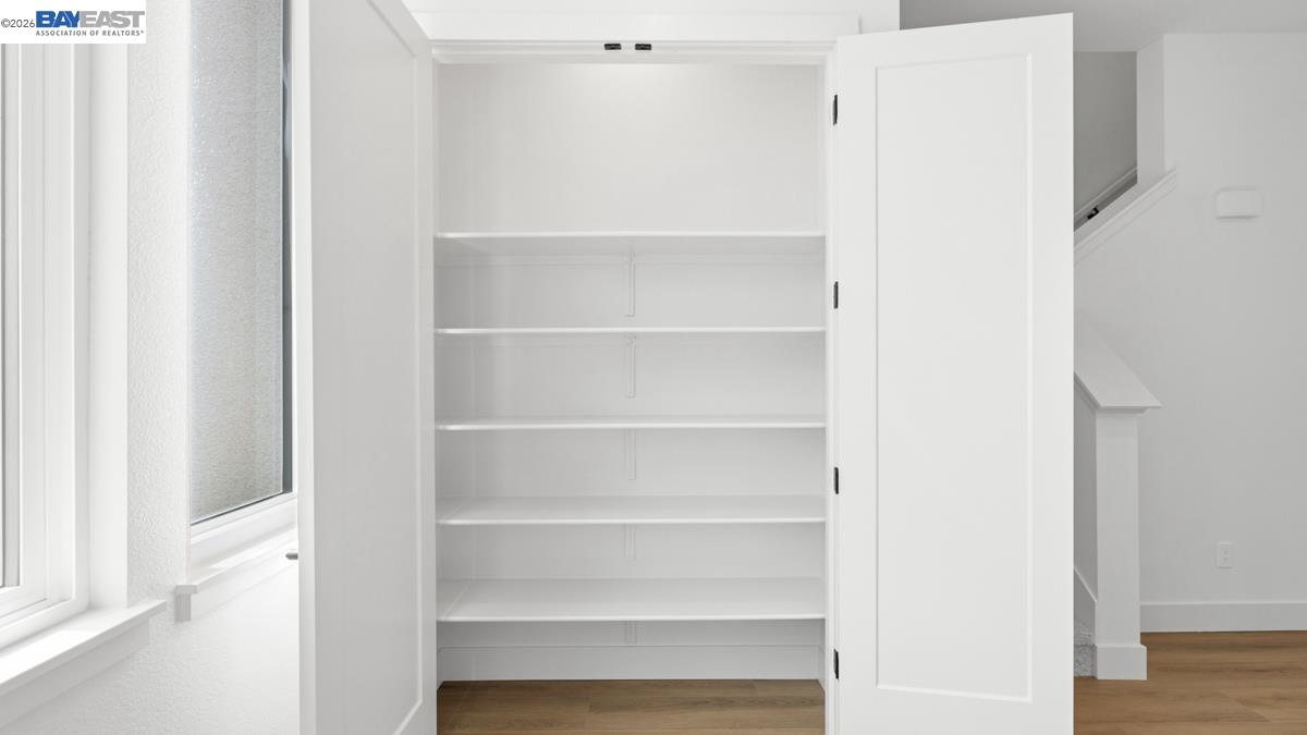 1925 Grand Street Alameda, CA 94501 - Photo 13 of 39 a view of walk in closet with empty racks