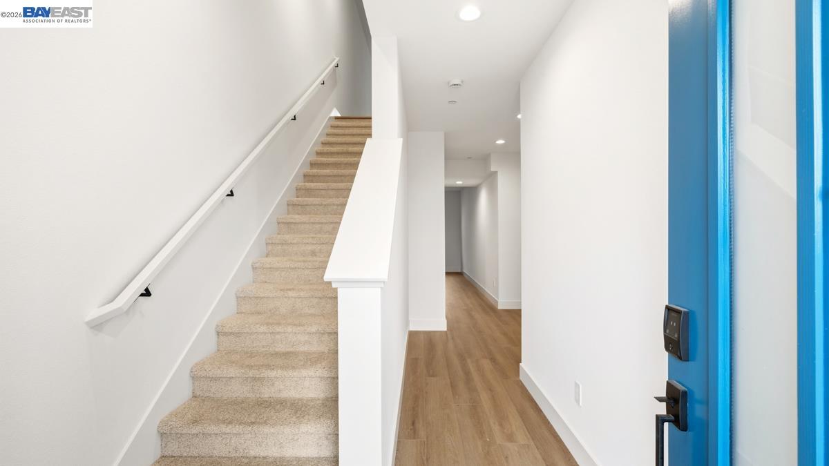1925 Grand Street Alameda, CA 94501 - Photo 2 of 39 a view of a hallway with wooden floor