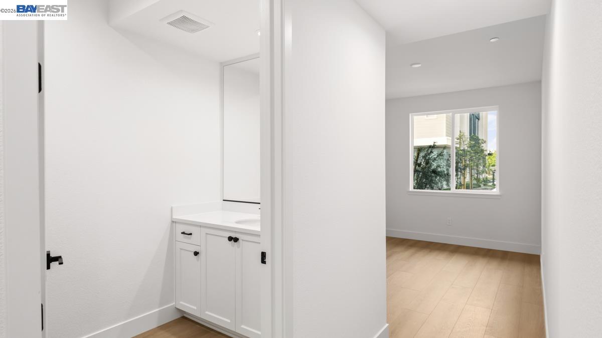 1925 Grand Street Alameda, CA 94501 - Photo 3 of 39 a view of an entryway with wooden floor