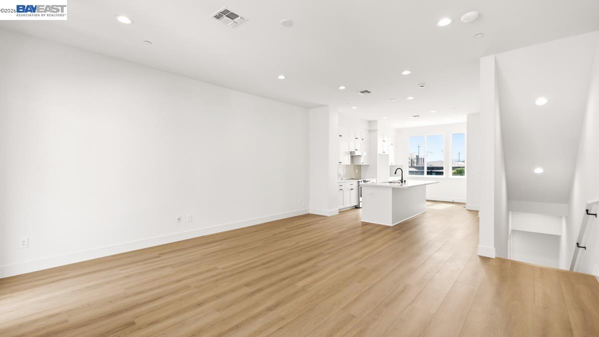 1925 Grand Street Alameda, CA 94501 - Photo 5 of 39 a view of a kitchen with wooden floor