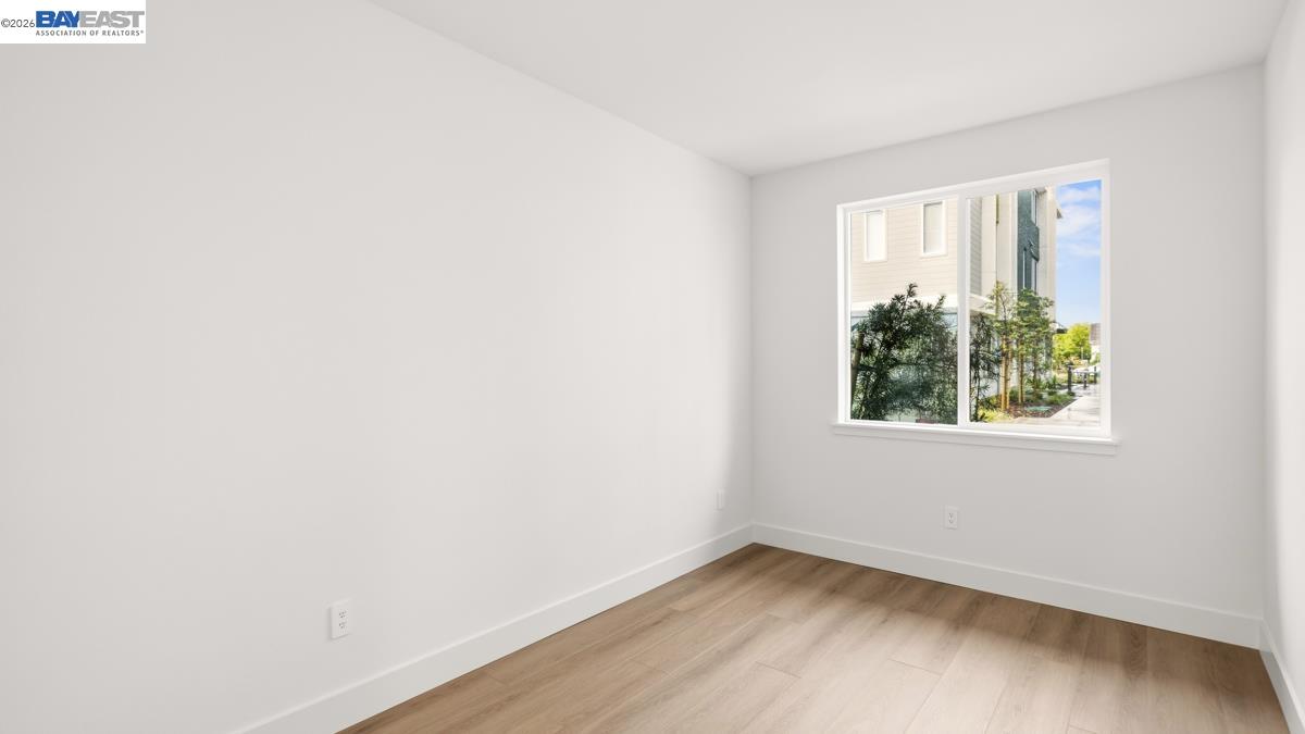 1925 Grand Street Alameda, CA 94501 - Photo 6 of 39 an empty room with a window