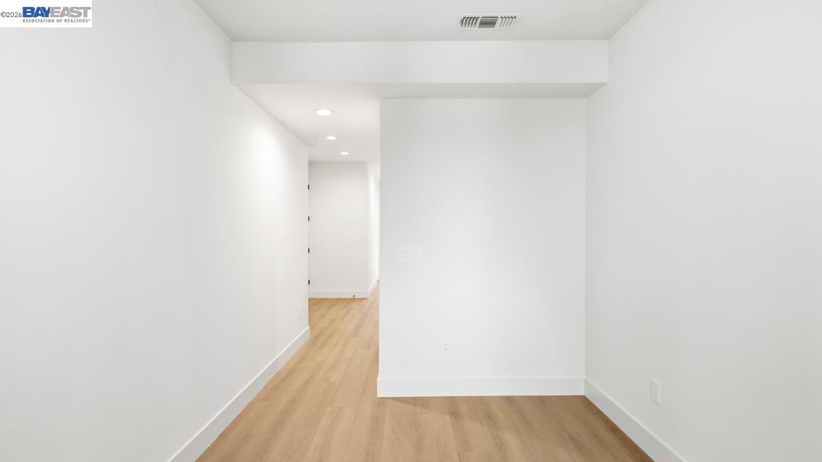 1925 Grand Street Alameda, CA 94501 - Photo 7 of 39 a view of a room with wooden floor