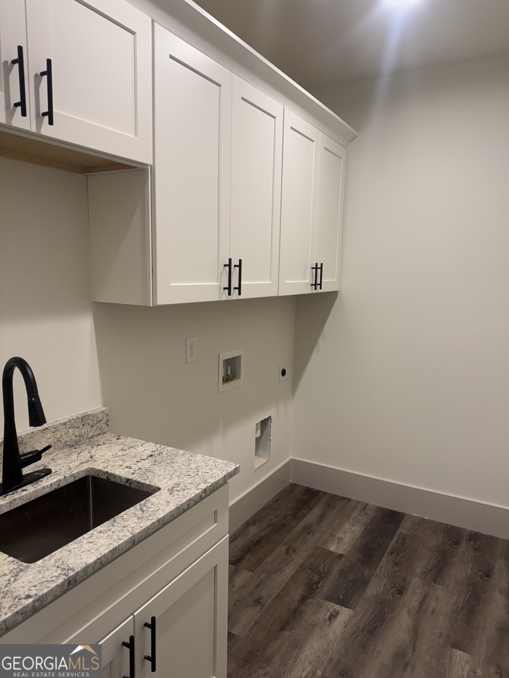 115 Cliffs Drive Dalton, GA 30721 - Photo 6 of 10 a view of a kitchen with sink and cabinets