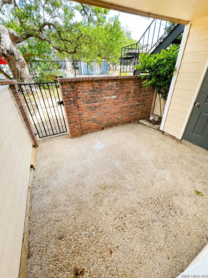 11610 Vance Jackson Road, Unit 867 San Antonio, TX 78230 - Photo 3 of 10 a view of outdoor space and yard