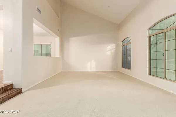 an empty room with windows