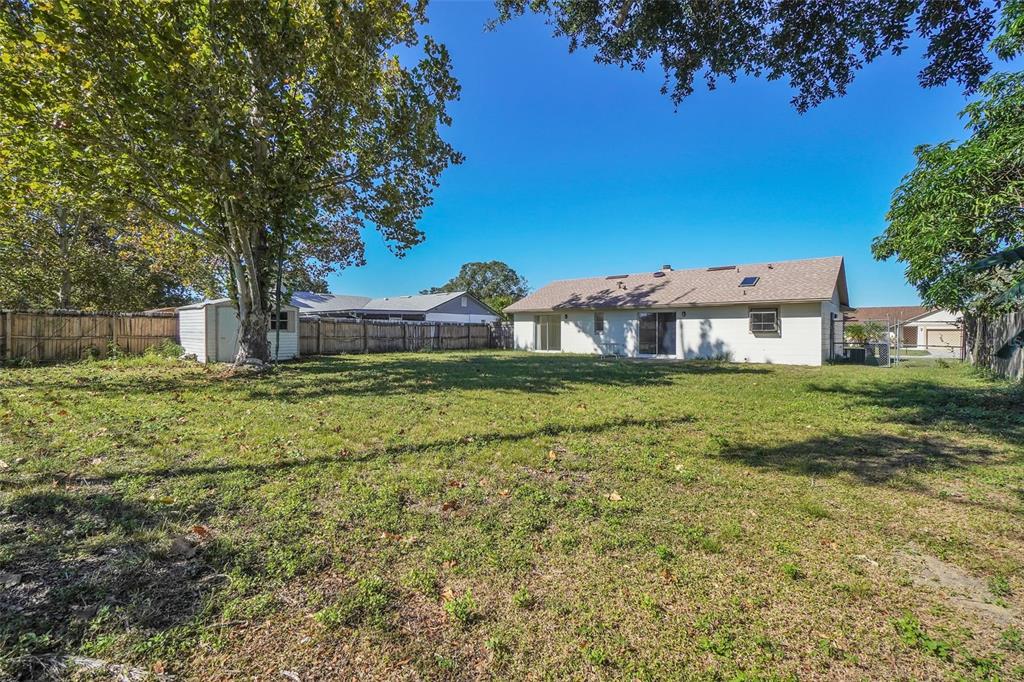 7724 Pengrove Pass Orlando, FL 32835 - Photo 23 of 24 a house view with garden space