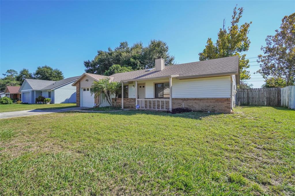 7724 Pengrove Pass Orlando, FL 32835 - Photo 3 of 24 a view of house with outdoor space and seating area