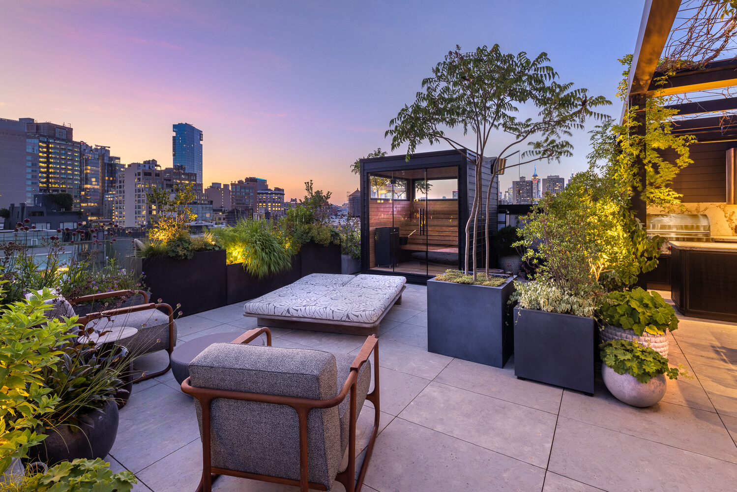 20 Greene Street, Unit PH Manhattan, NY 10013 - Photo 12 of 38 a view of a terrace with furniture and a fire pit