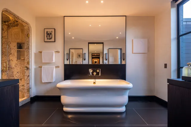 a large bathroom with a toilet