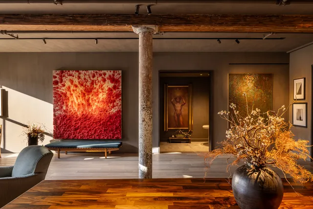 a living room with a fireplace