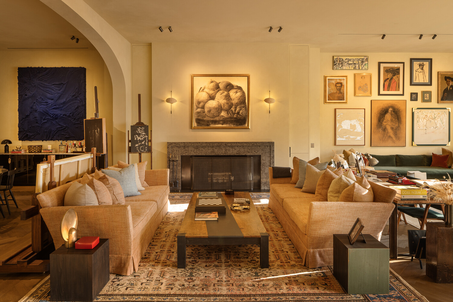 20 Greene Street, Unit PH Manhattan, NY 10013 - Photo 6 of 38 a living room with furniture windows and a fireplace