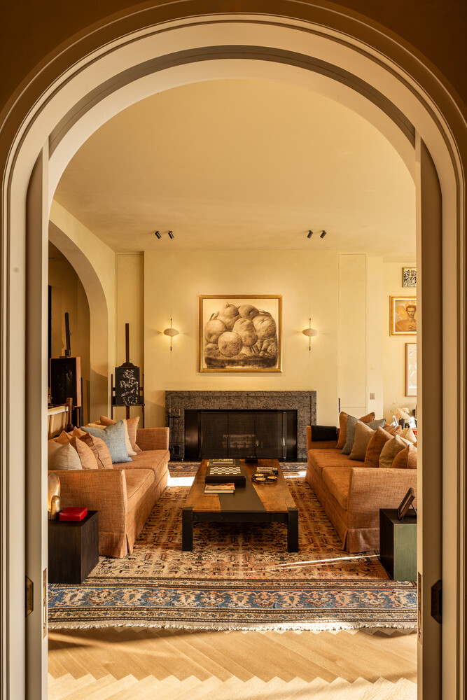 20 Greene Street, Unit PH Manhattan, NY 10013 - Photo 9 of 38 a living room with furniture and a fireplace