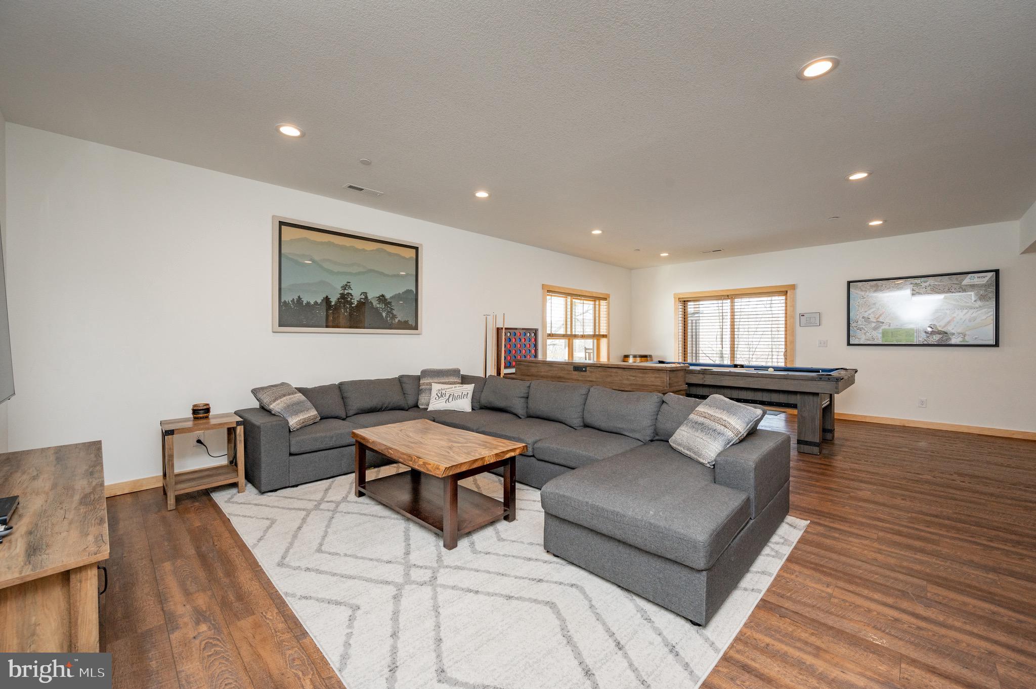 828 North Camp Road McHenry, MD 21541 - Photo 40 of 59 a living room with furniture and wooden floor