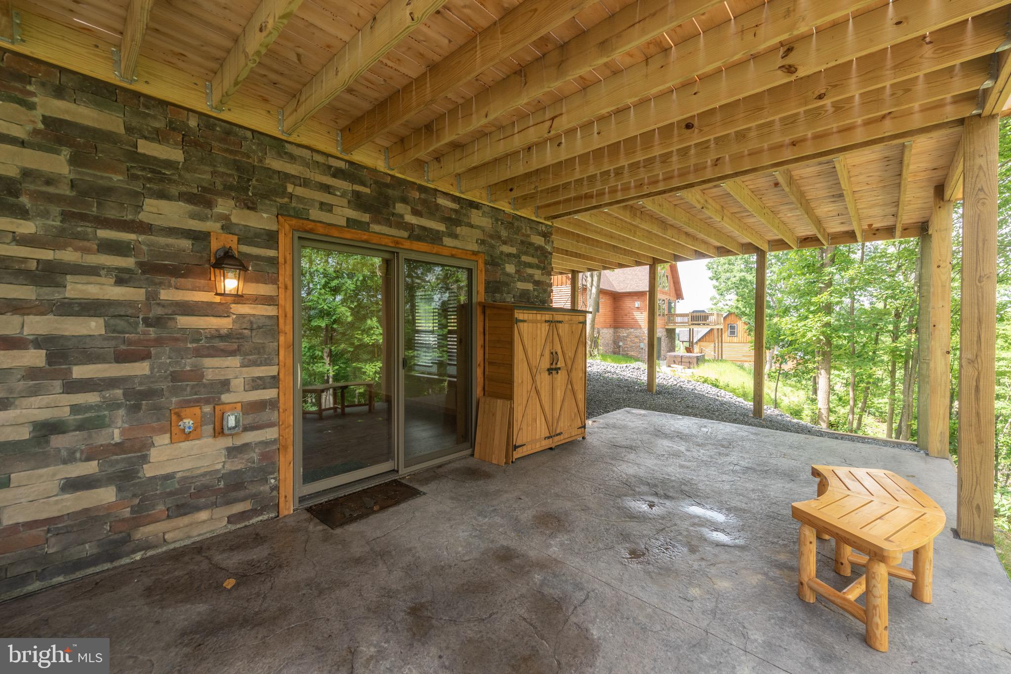 828 North Camp Road McHenry, MD 21541 - Photo 52 of 59 a view of a room with wooden walls and outdoor space