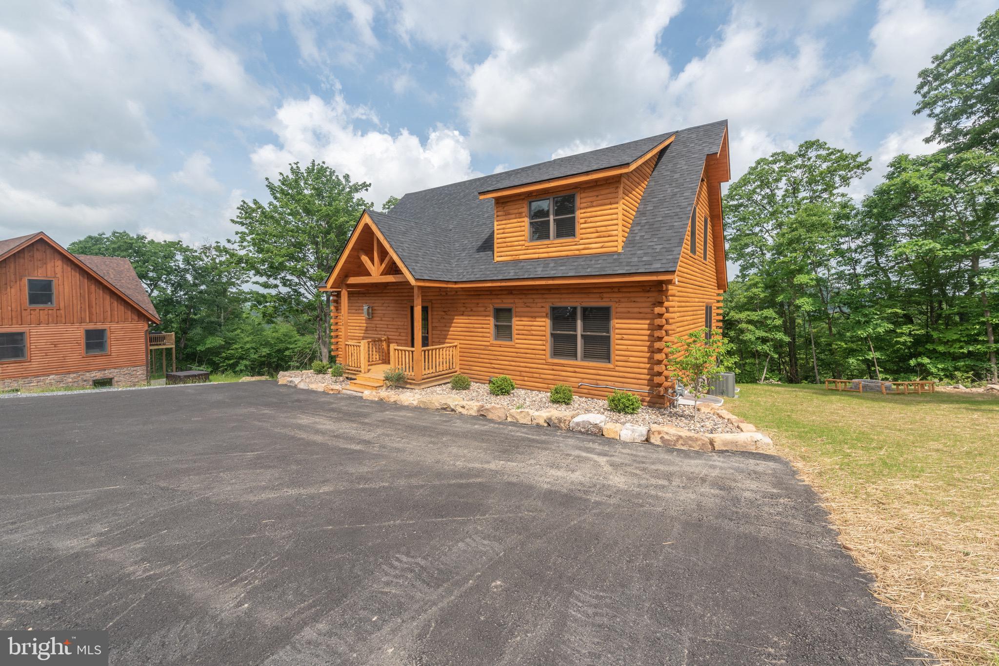 828 North Camp Road McHenry, MD 21541 - Photo 58 of 59 a front view of house with yard and trees around