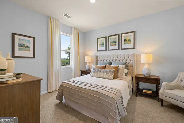 a bathroom that has a glass shower door