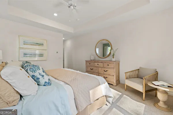 an empty room with wooden floor and closet