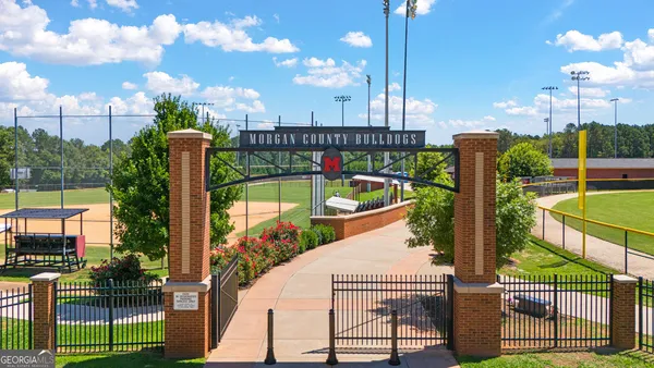 a view of a wooden door of the house