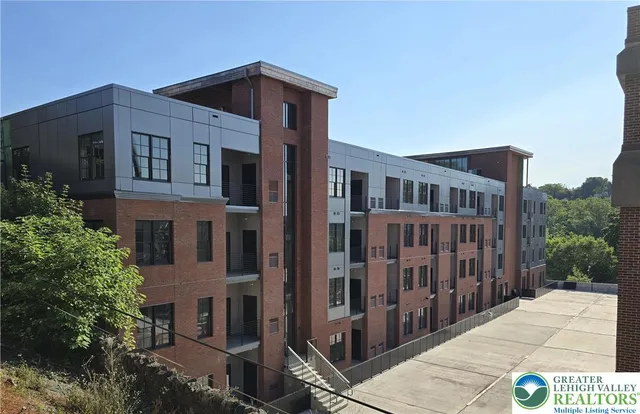 a front view of a house with yard