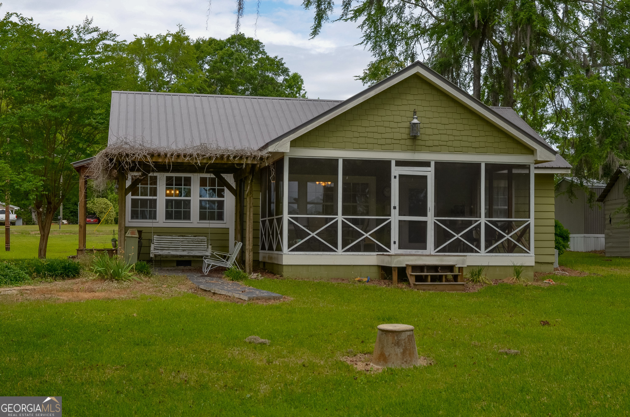 110 Tom Holman Road Cobb, GA 31735 - Photo 2 of 18 a view of a house with a yard